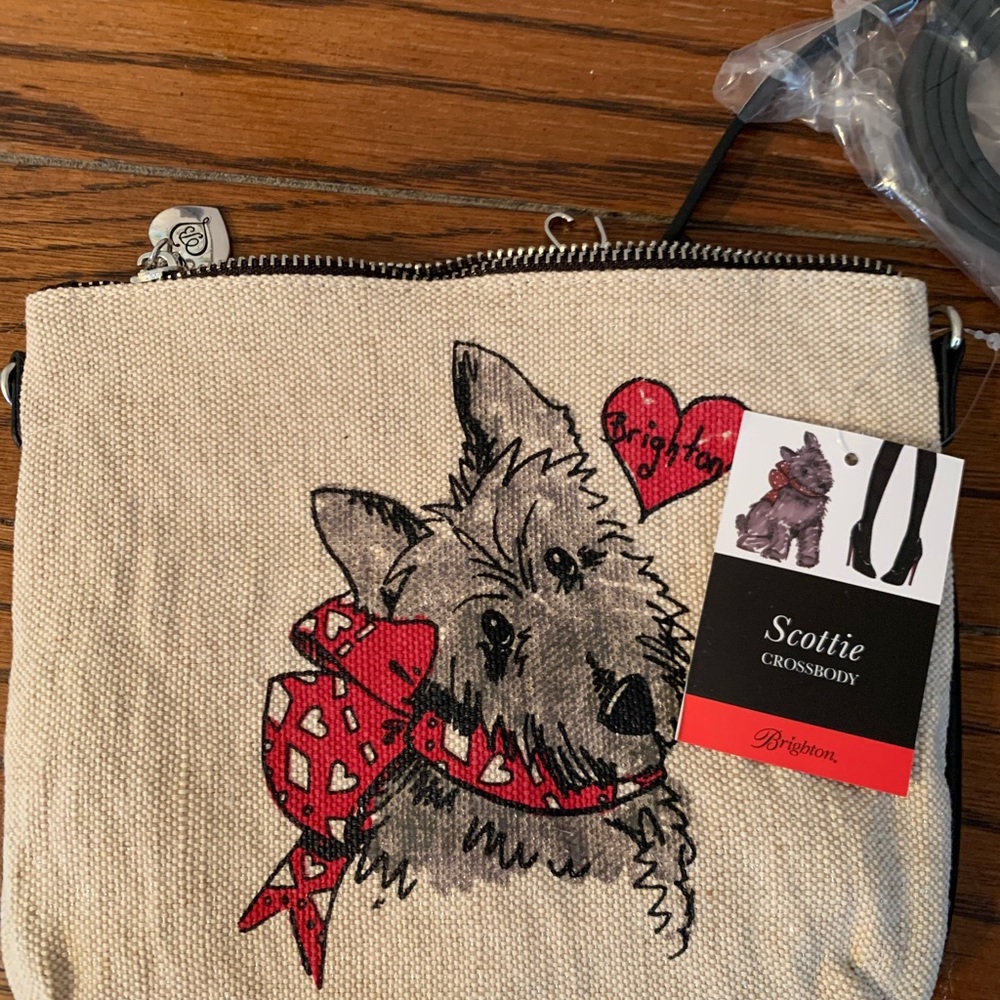 Brighton cute cross body. 9 1/2” w x 8” h.